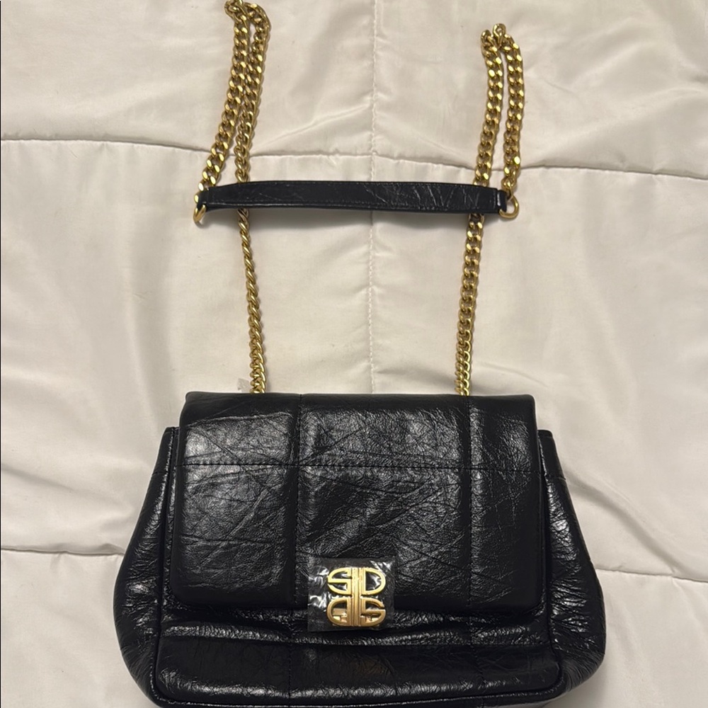 Elegant Black Leather Bag with Gold Chain